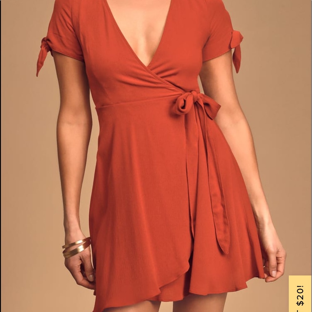 Burnt orange wrap mini dress. Size S